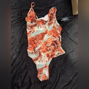 Rust body suit. Never worn
